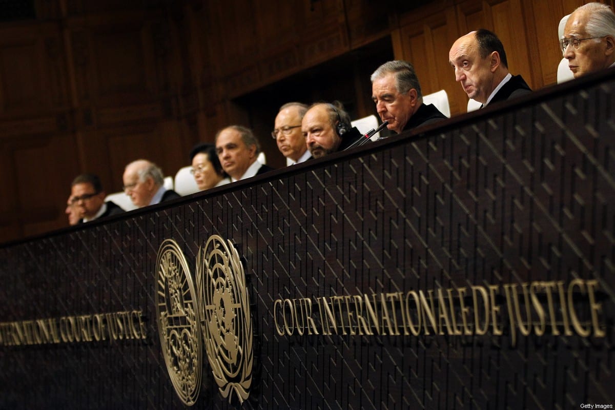 Members of the jurysit in the International Court of Justice in The Hague, Netherlands. [Photo credit should read BAS CZERWINSKI/AFP via Getty Images]