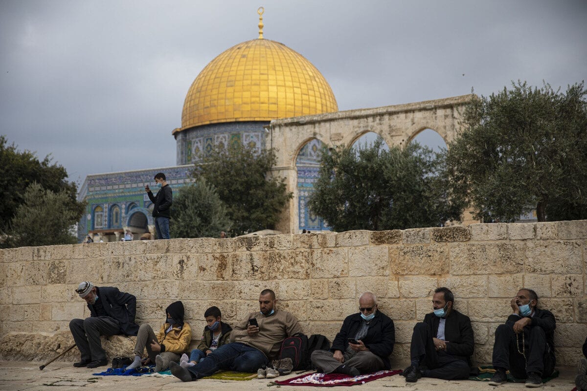 Palestinians gather to perform Friday prayer at Masjid al-Aqsa complex in East Jerusalem’s Old City on November 6, 2020 [Mostafa Alkharouf/Anadolu Agency]