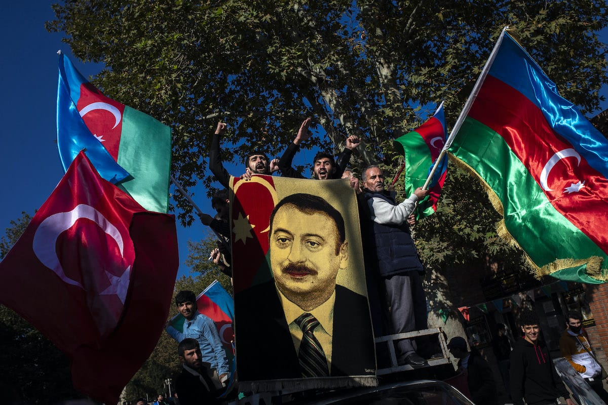 GANJA, AZERBAIJAN – NOVEMBER 10: Azerbaijani people celebrate the deal
