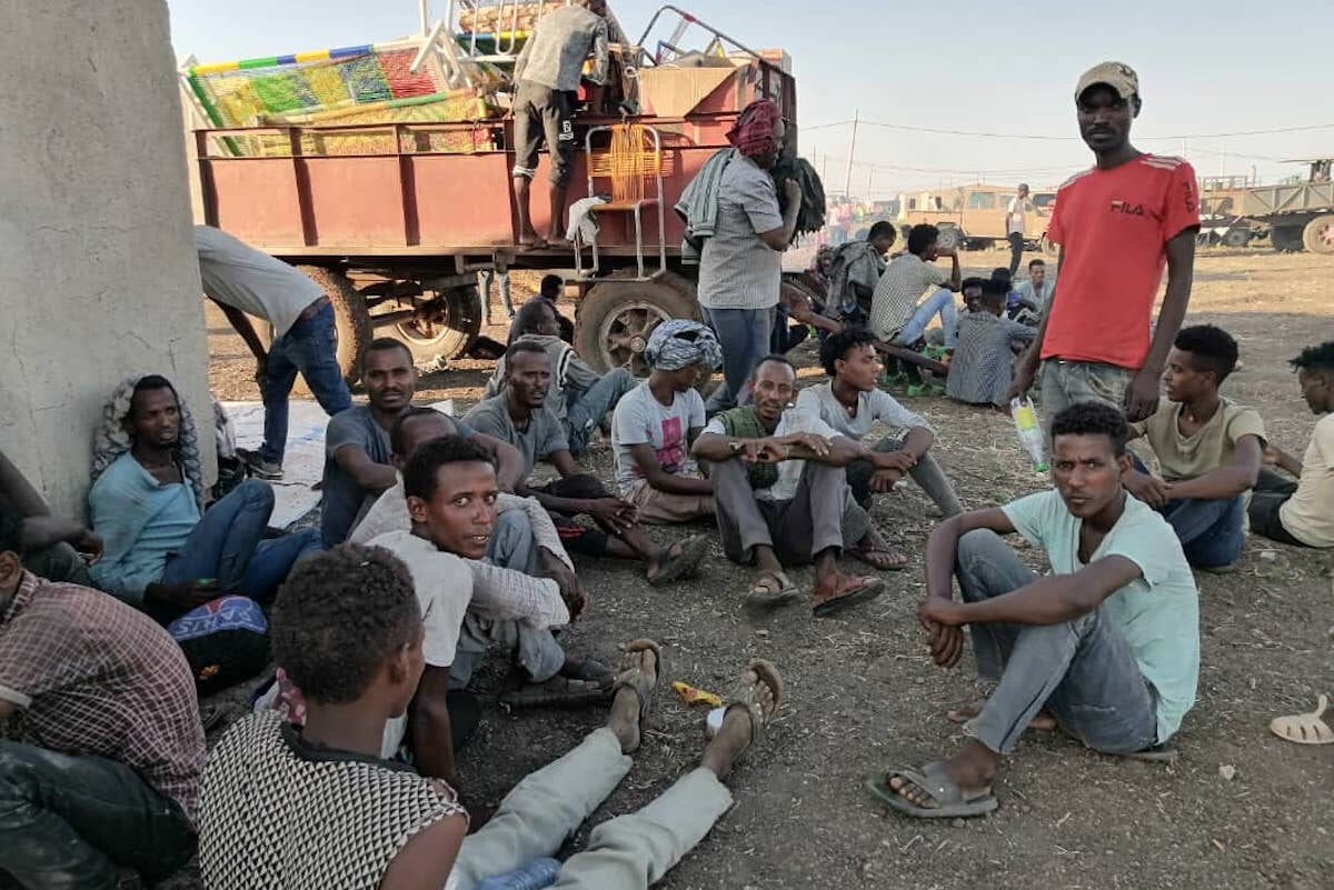 Ethiopians, who fled the conflict in the Tigray region in northern Ethiopia reach Al Qadarif State, Sudan on 14 November 2020 [Stringer/Anadolu Agency]