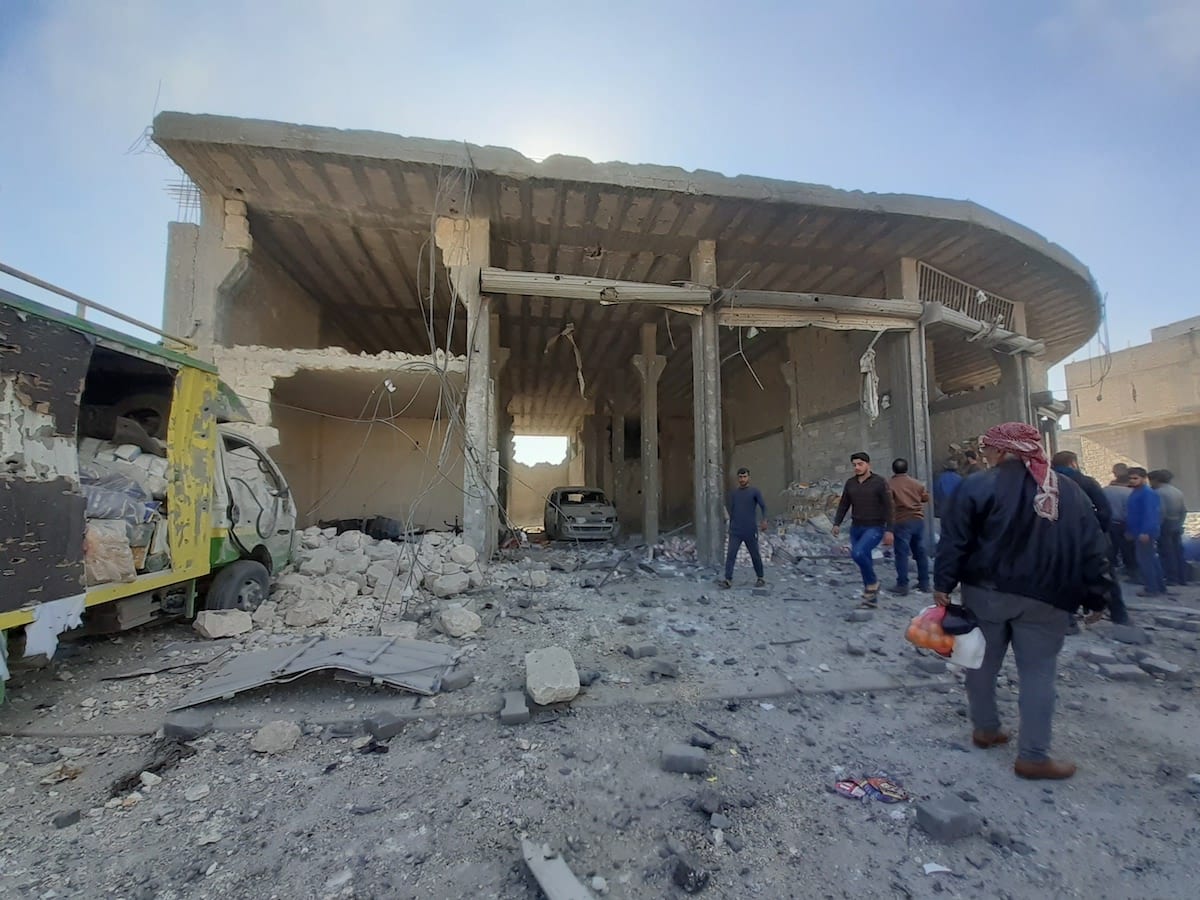 ALEPPO, SYRIA NOVEMBER 24 People inspect the site after a bomb blast in alBab district of