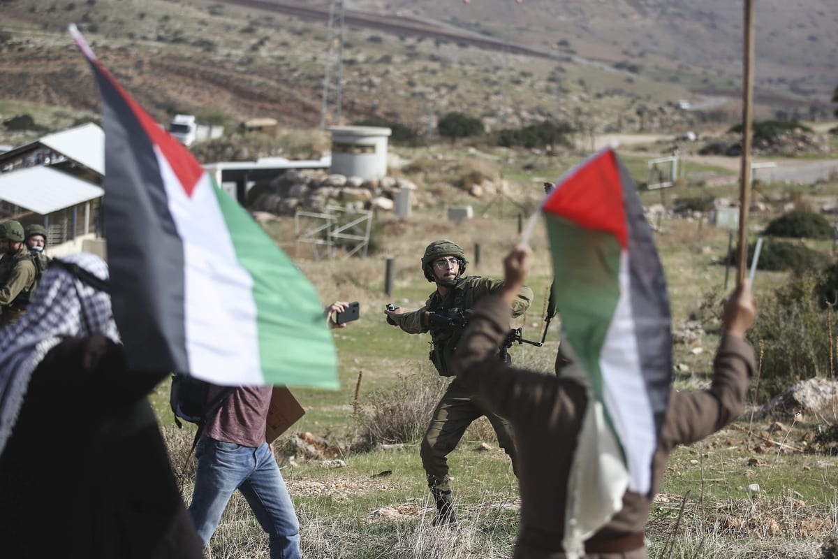 Israeli forces intervene in Palestinians with tear gas canisters during a protest against the planning of the construction of the Jewish settlement, in Jordan, Valley near West Bank on November 24, 2020. [Issam Rimawi - Anadolu Agency]