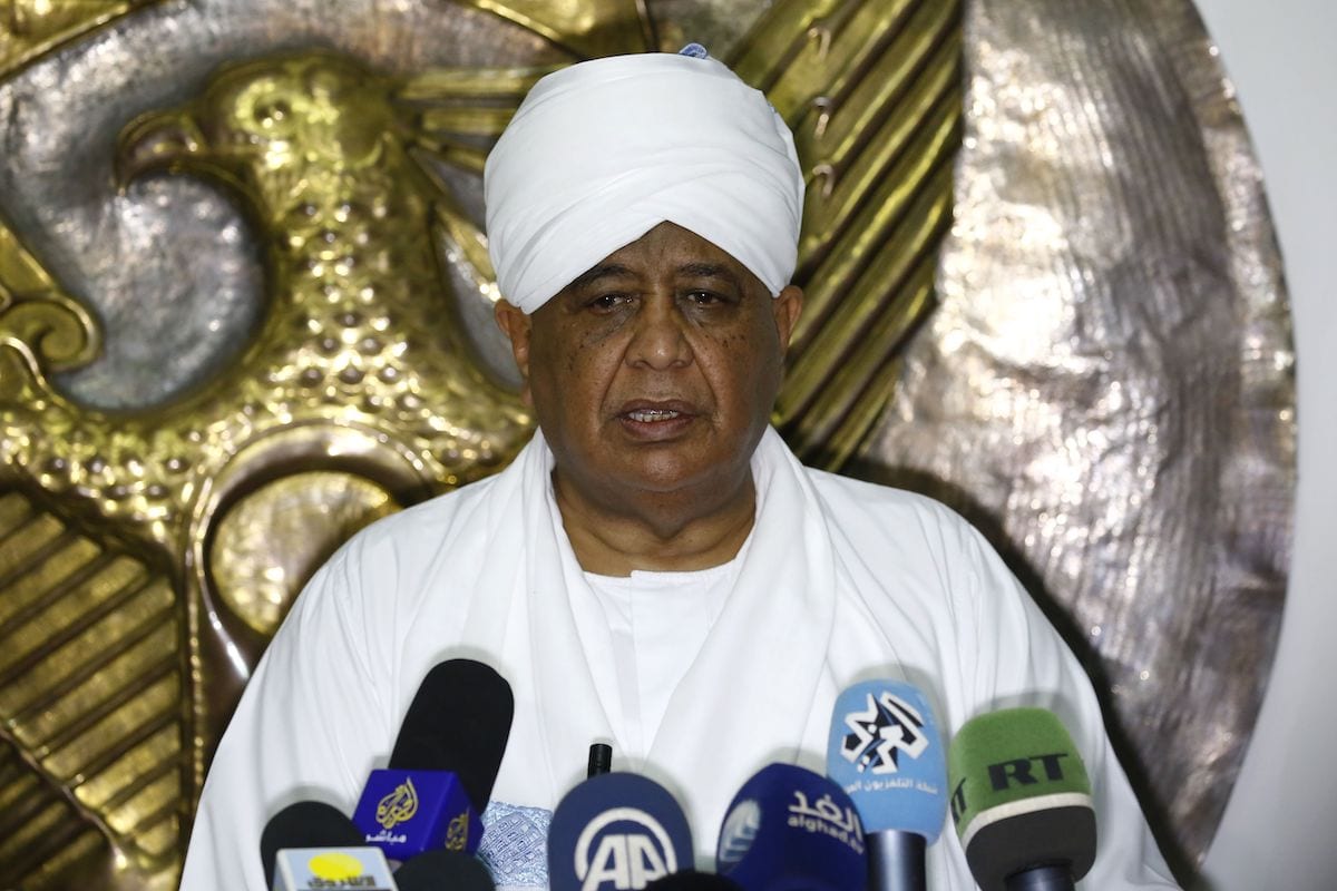 Sudanese Foreign Minister Ibrahim Ghandour speaks to the press following a meeting with his Qatari counterpart in Khartoum, on 10 March 2018. [ASHRAF SHAZLY/AFP via Getty Images]
