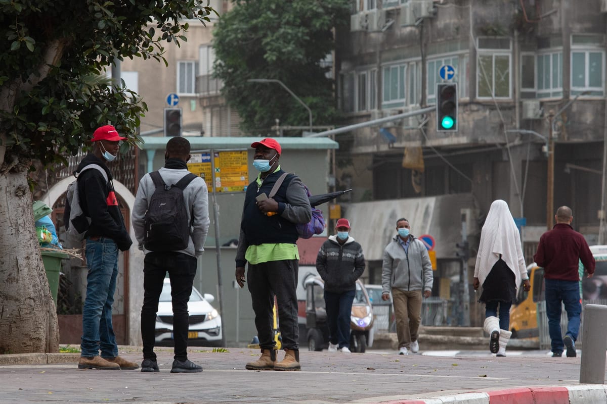 Migrants, living in Neve Sha'anan neighborhood are seen in Tel Aviv, Israel on December 16, 2020 [Nir Keidar/Anadolu Agency]