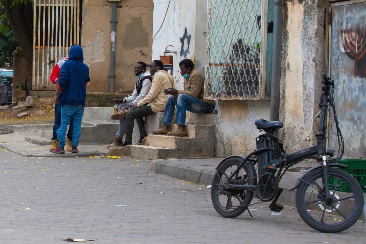 Migrants, living in Neve Sha'anan neighborhood are seen in Tel Aviv, Israel on December 16, 2020 [Nir Keidar/Anadolu Agency]