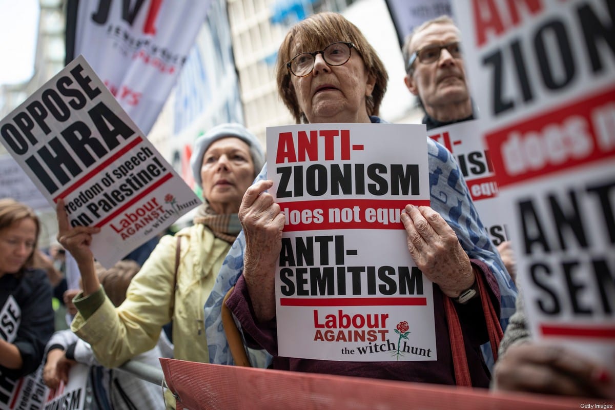 Demonstrators take part in protests outside a meeting of the National Executive of Britains Labour Party on 4 September 2018 in London, England. [Dan Kitwood/Getty Images]