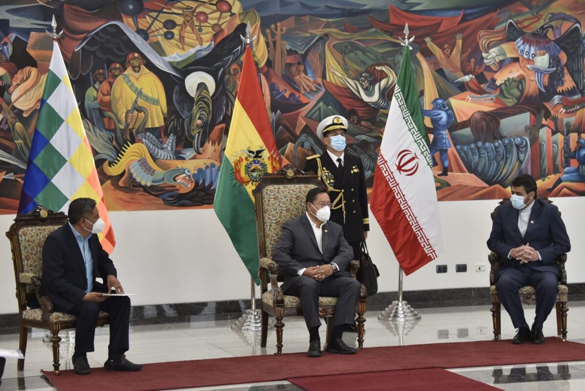 Bolivian President Luis Arce (C) and Foreign Minister Rogelio Mayta (L) talk with Iran's new ambassador to Bolivia, Mortessa Tabreshi, during the credentials ceremony in La Paz, on November 11, 2020 [AIZAR RALDES/AFP via Getty Images]