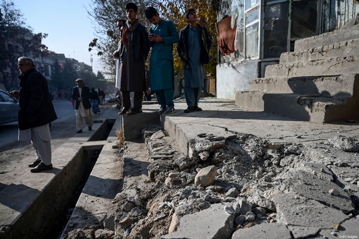 Residents gather at a site after several rockets land at Khair Khana, north west of Kabul on November 21, 2020. - A series of loud explosions shook central Kabul on November 21, including several rockets that landed near the heavily fortified Green Zone where many embassies and international firms are based, officials said. (Photo by WAKIL KOHSAR / AFP) (Photo by WAKIL KOHSAR/AFP via Getty Images)