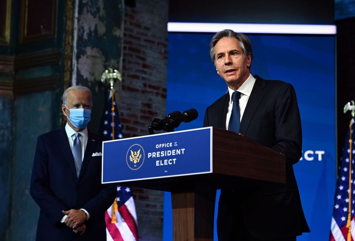 Nominated Secretary of State Antony Blinken(R) participates as US President-elect Joe Biden speaks during a cabinet announcement event in Wilmington, Delaware, on 24 November 2020. [CHANDAN KHANNA/AFP via Getty Images]