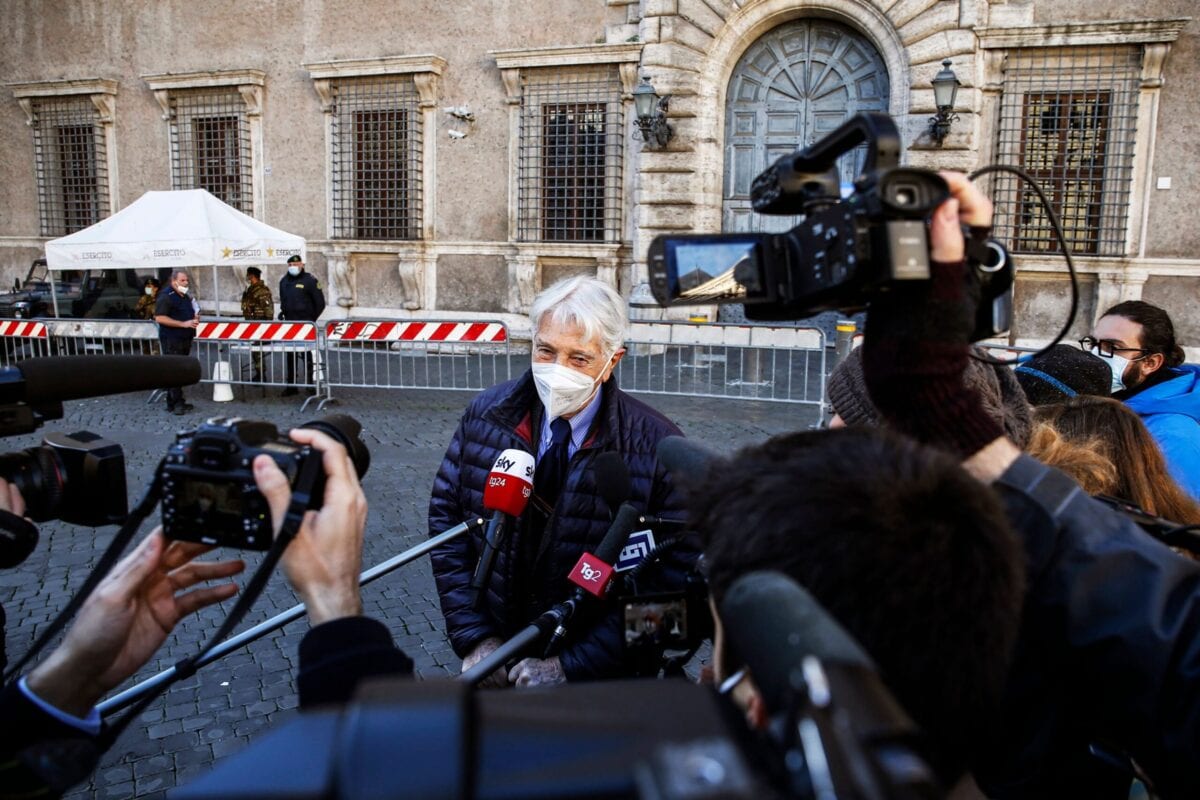 Italian journalist and writer Corrado Augias talks with journalists in front of the French Embassy in Rome on December 14, 2020, as he arrive to return his Legion of Honor medal to the French ambassador. - Augias announced on December 13,2020 that he would return his Legion of Honor to the French ambassador, in protest to that granted to Egyptian President Abdel Fattah al-Sisi, described as "an accomplice of atrocious criminals". "In my opinion, President French Macron should not have granted the Legion of Honor to a Head of State who objectively became an accomplice of atrocious criminals. I say this in memory of poor Giulio Regeni, but also for France, for the importance that this distinction still represents, two centuries after having been established ", talks Augias, decorated in 2007. (Photo by FABIO FRUSTACI / ANSA / AFP) (Photo by FABIO FRUSTACI/ANSA/AFP via Getty Images)