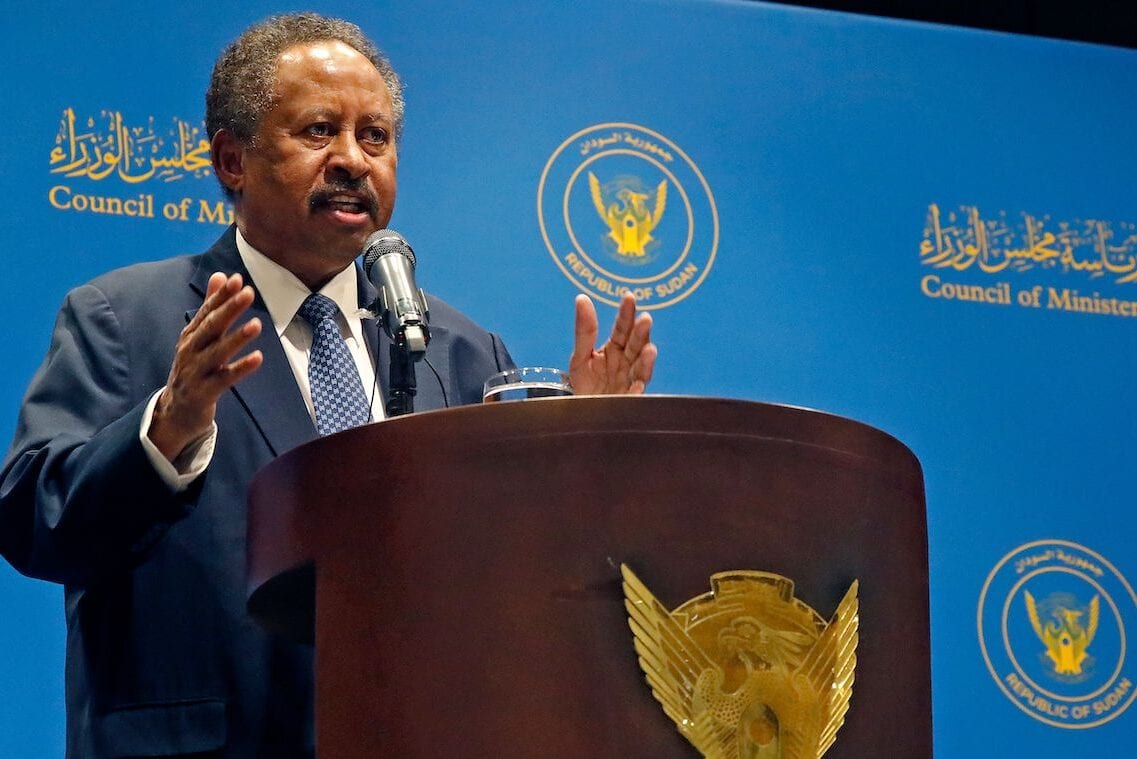 Sudan's Prime Minister Abdalla Hamdok gives a press conference in Khartoum on 14 December 2020. [ASHRAF SHAZLY/AFP via Getty Images]