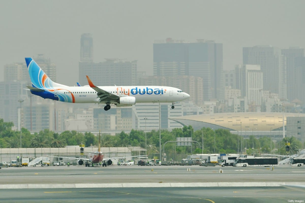 A FlyDubai Boing 737-800 landing at the tarmac at Dubai's International Airport [GIUSEPPE CACACE/AFP via Getty Images]