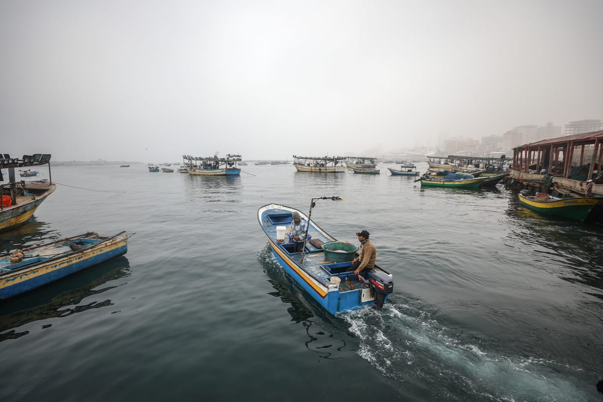Fishermen sail to the sea at the Port of Gaza in Gaza City, Gaza on 5 January 2021 [Ali Jadallah/Anadolu Agency]