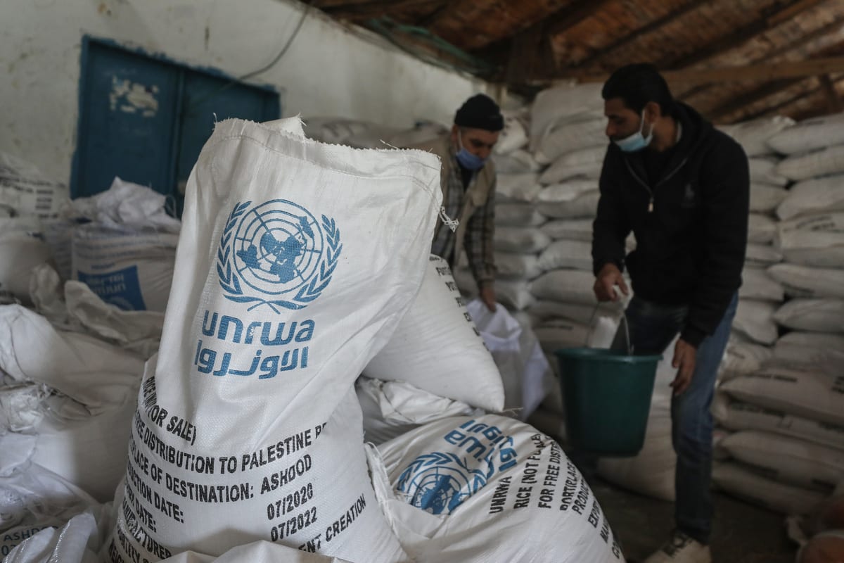 Workers of United Nations Palestine Refugee Agency (UNRWA) [Ali Jadallah/Anadolu Agency]