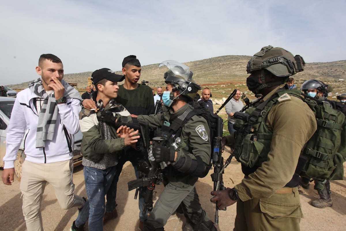 TUBAS, WEST BANK - JANUARY 27: Israeli forces intervene in Palestinians after trees were destroyed by Israeli forces in Tubas, West Bank, January 27, 2021. Israeli forces destroyed thousands of trees in the woods on the grounds that they were at the military exercise area. ( Nedal Eshtayah - Anadolu Agency )