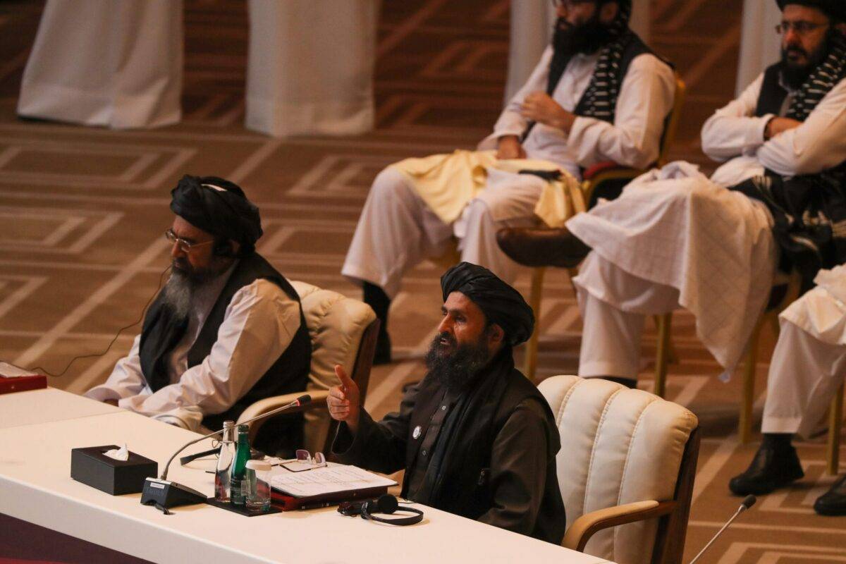 Taliban co-founder Mullah Abdul Ghani Baradar speaks during the opening session of the peace talks between the Afghan government and the Taliban in the Qatari capital Doha on September 12, 2020 [KARIM JAAFAR/AFP via Getty Images]