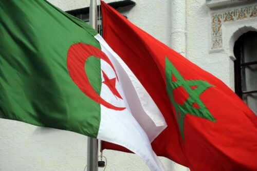 The flags of Algeria (L) and Morocco flutters in Algiers, Algeria on 24 January 2012 [FAROUK BATICHE/AFP/Getty Images]