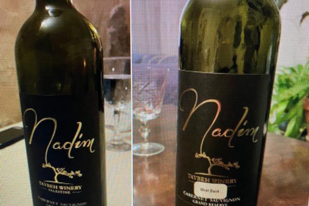 A wine seller covered the word “Palestine” on the label with a version saying “West Bank” in Canada 11 January 2021 [Nyla.matuk/Facebook]