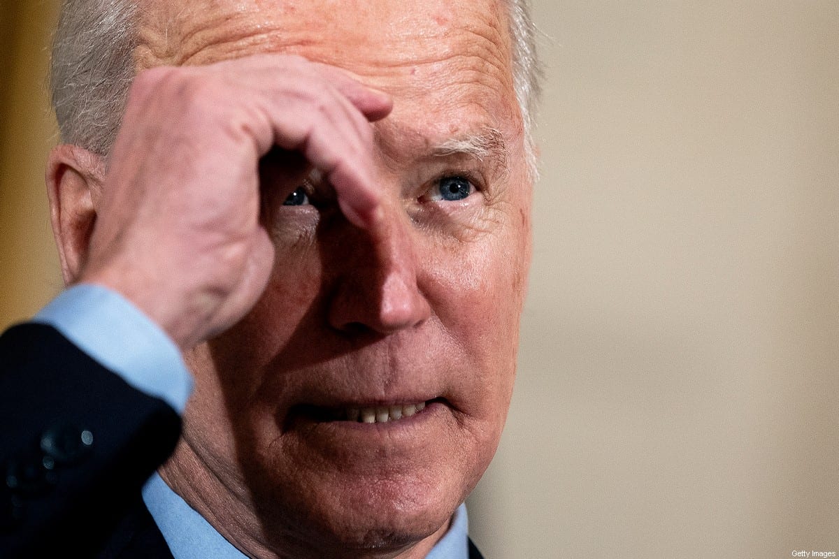 US President Joe Biden delivers remarks on the national economy and the need for his administration's proposed $1.9 trillion coronavirus relief legislation in the State Dining Room at the White House on 5 February 2021 in Washington, DC. [Stefani Reynolds-Pool/Getty Images]