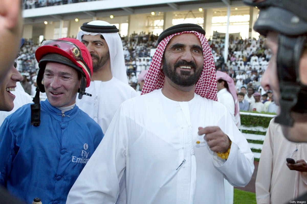 Crown Prince of Dubai Sheikh Mohammed bin Rashid al-Maktoum (R) in Dubai on 23 March 2002 [RABIH MOGHRABI/AFP via Getty Images]