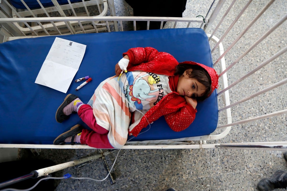 A kid receiving medical aid due to malnutrition at Al Sabeen Maternal Hospital as Yemeni children face deadly hunger and aid shortages in Sanaa, Yemen on February 13, 2021 [Mohammed Hamoud/Anadolu Agency]