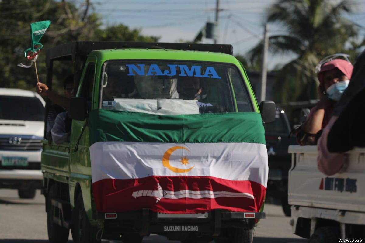 People of Bangsamoro Autonomous Region stage a peace convoy event to support the campaign to extend the term of the transition government in the region to 2025, Philippines on March 21, 2021 [Benyamen Cabuntalan - Anadolu Agency]