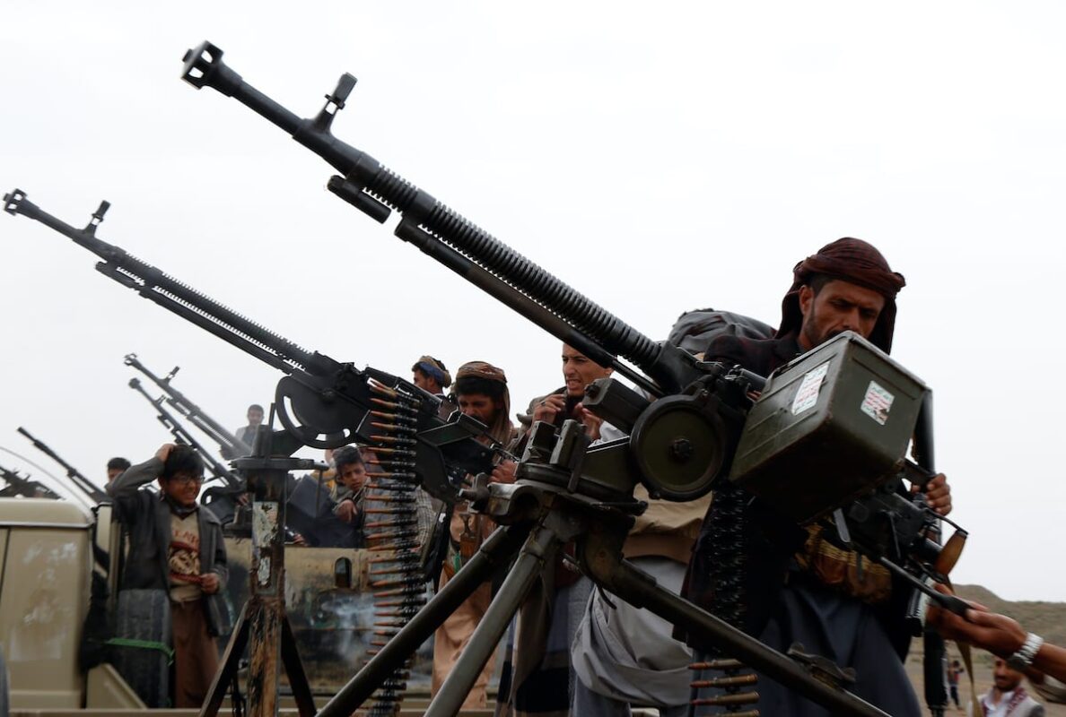 Houthis check weapons on military trucks during a tribal gathering on 1 August 2019 in Sana'a, Yemen [Mohammed Hamoud/Getty Images]