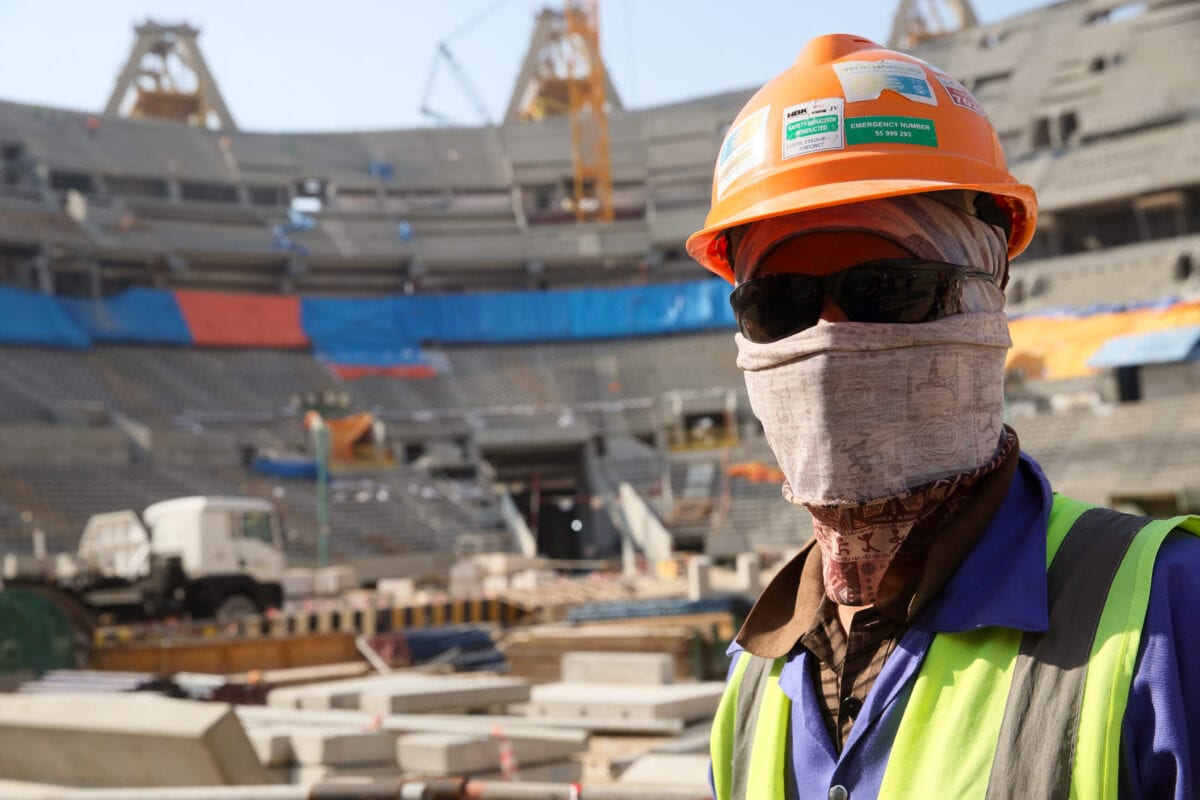 Construction workers in the Lusail Iconic Stadium in Doha, Qatar on December 21, 2019 in Doha, Qatar [Matthew Ashton/AMA/Getty Images]