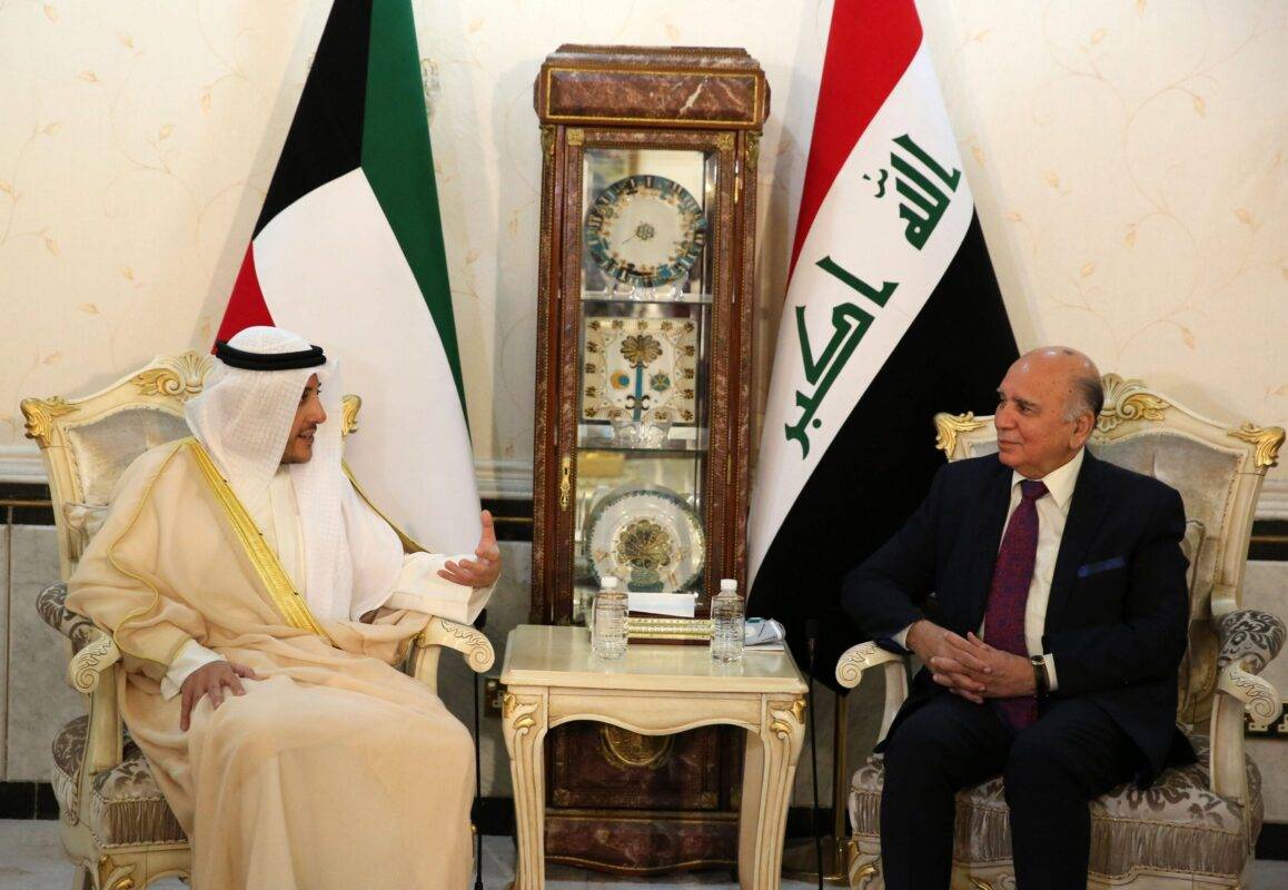 Fuad Hussein, Iraq's Forein Minister (R), meets with his Kuwaiti counterpart  Sheikh Ahmad al-Nasser al-Sabah (2-L) at the ministry of foreign affairs in the capital Baghdad, on June 14, 2020 [AHMAD AL-RUBAYE/AFP via Getty Images]