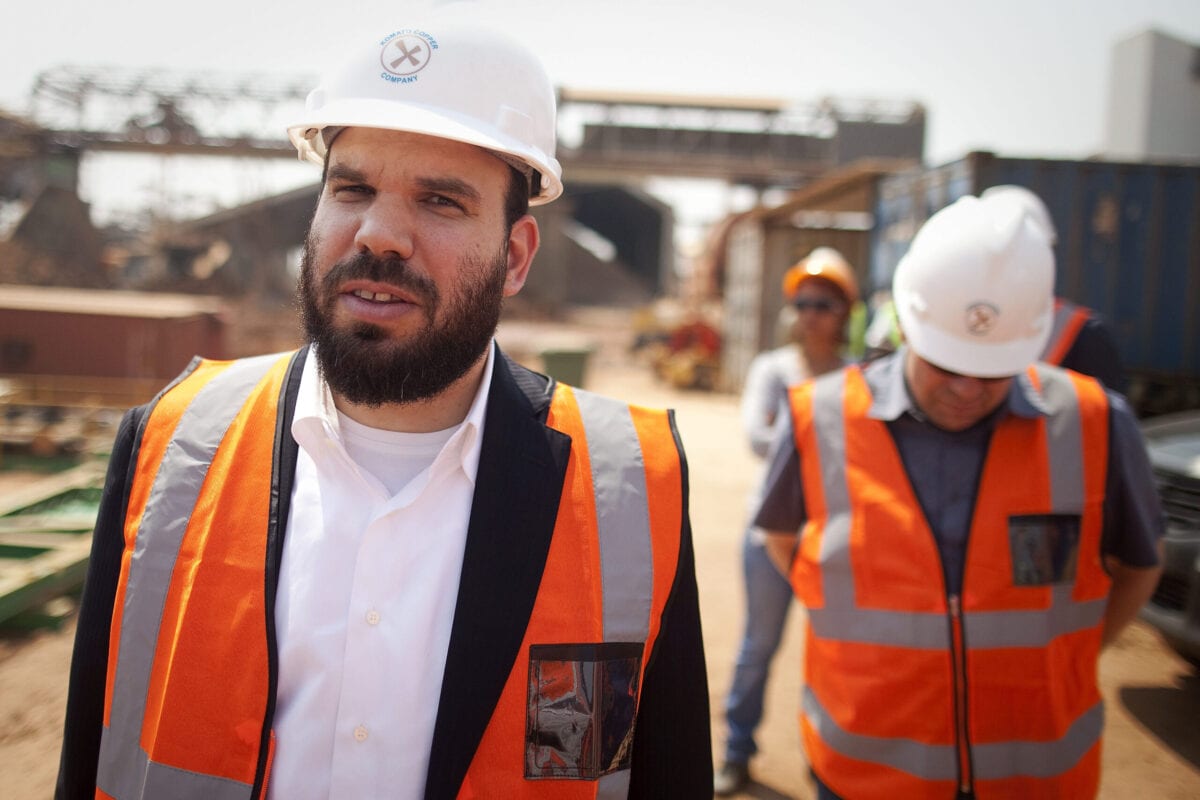 Israeli billionaire Dan Gertler, left, takes a tour of the Katanga Mining Ltd. copper and cobalt mine complex with Shimon Cohen, right, his communications advisor, right, in Kolwezi, Democratic Republic of Congo, on Wednesday, Aug. 1, 2012 [Simon Dawson/Bloomberg via Getty Image]
