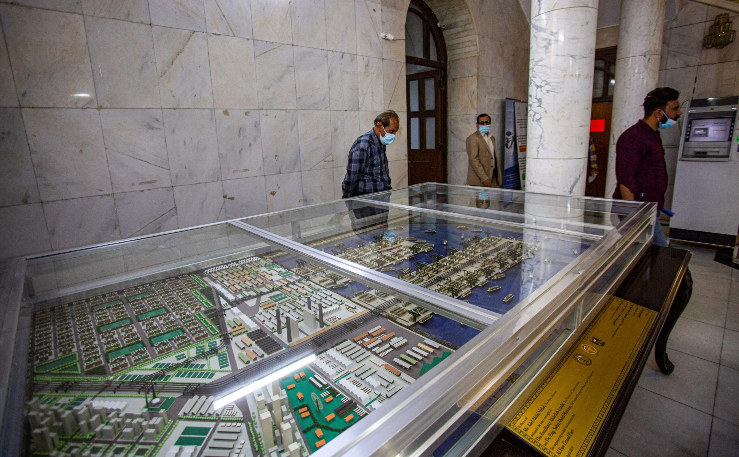 This picture taken on March 16, 2021 shows a model for the Faw Grand Port on display at the ports authority in Iraq's southern city of Basra [HUSSEIN FALEH/AFP via Getty Images]