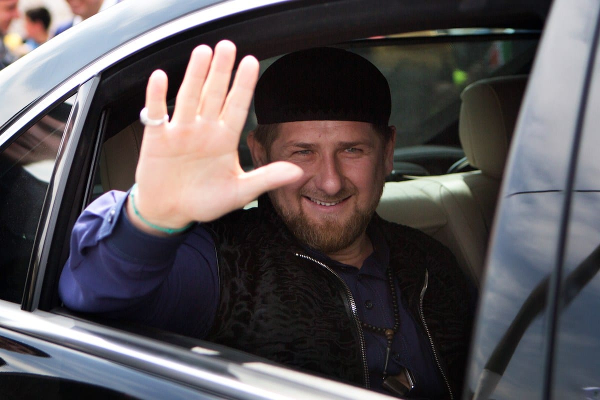 Chechen President Ramzan Kadyrov (C) waves to the crowd following a dedication ceremony of a new mosque in the Arab Israeli town of Abu Ghosh, west of Jerusalem on 23 March 2014. [MENAHEM KAHANA/AFP via Getty Images]