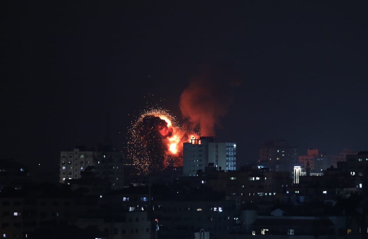 Fire billow from Israeli air strikes in Gaza City, Gaza on May 10, 2021 [Mustafa Hassona/Anadolu Agency]