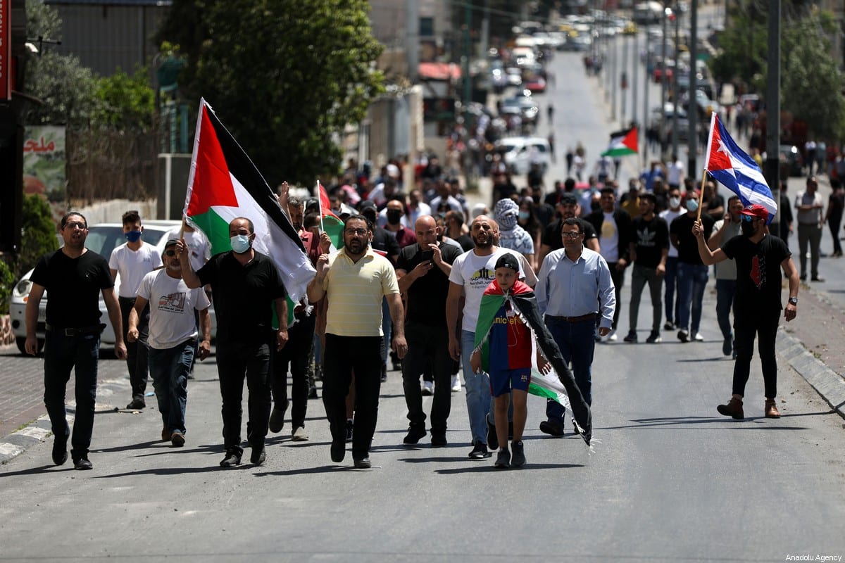 Palestinians gather during a protest against Israeli forces' attacks over Jerusalem and Gaza, on May 14, 2021 in Bethlehem, West Bank [Wisam Hashlamoun / Anadolu Agency]