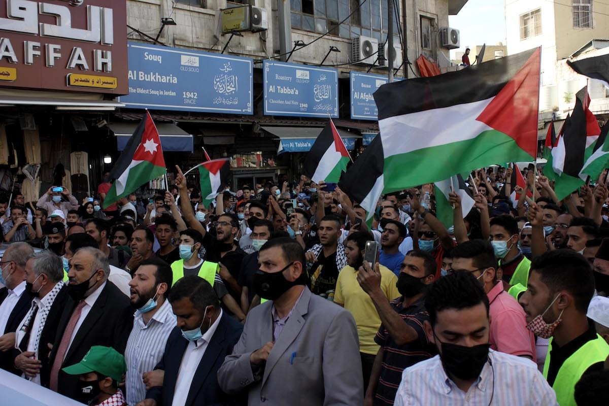 Supporters of Palestinians and Israel protest and pray around the