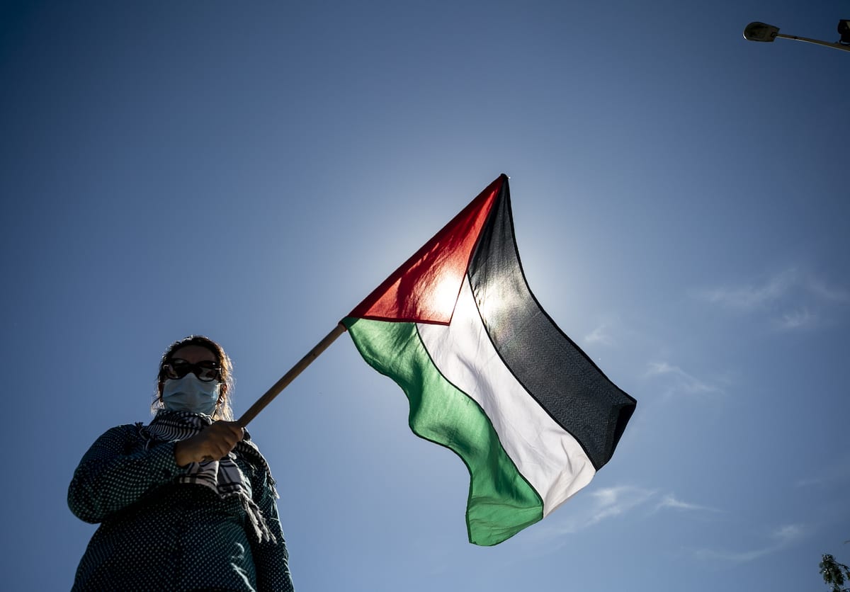 People gather in front of US Embassy during a demonstration in support of Palestinians and to protest against Israeli attacks to Palestinians, on May 21, 2021 in Tunis, Tunisia. [Yassine Gaidi - Anadolu Agency]