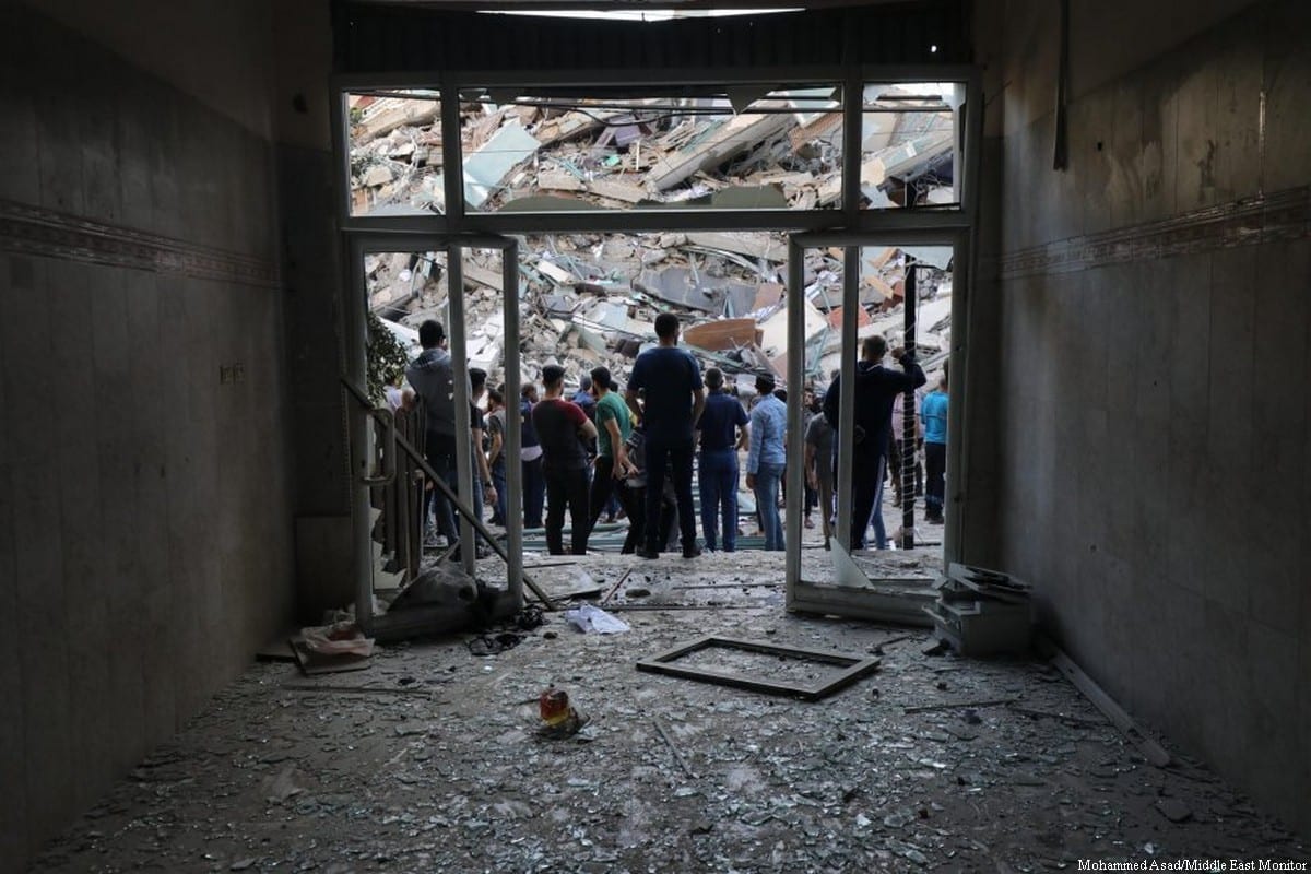 Israel destroyed the building housing foreign media in Gaza [Photo: Mohammed Asad/Middle East Monitor)