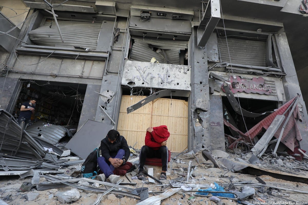 Damaged buildings are seen after Israel carried out air strikes in Gaza on 17 May 2021 [Mohammed Asad/Middle East Monitor]