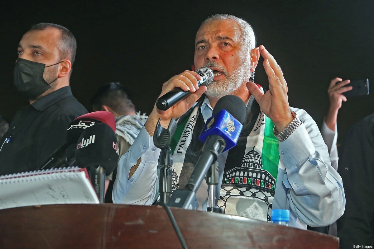 Hamas' political bureau chief Ismail Haniyeh addresses supporters during a rally in solidarity with the Palestinians outside Qatar's Imam Muhammad Abdel-Wahhab Mosque in the capital Doha on May 15, 2021 [KARIM JAAFAR/AFP via Getty Images]