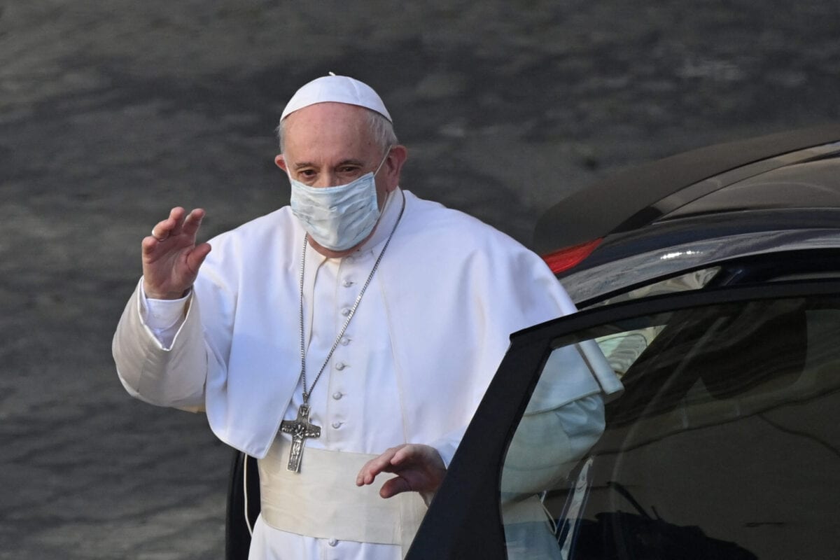 Pope Francis waves during his weekly outdoors general audience on May 26, 2021 at the San Damaso courtyard in the Vatican [ALBERTO PIZZOLI/AFP via Getty Images]