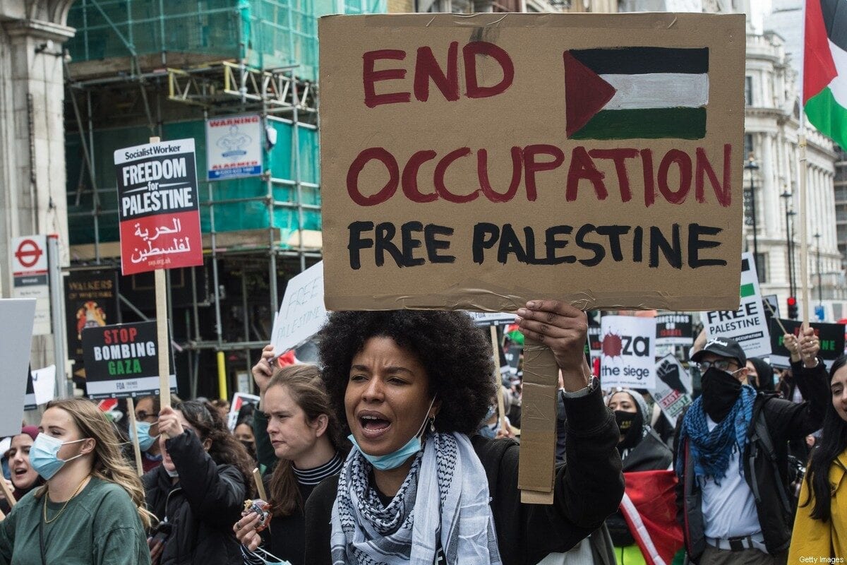 A huge demonstration of tens of thousands of people marches from the Embankment to Hyde park in solidarity with the Palestinian people on 22 May 2021 in London, England. [Guy Smallman/Getty Images]