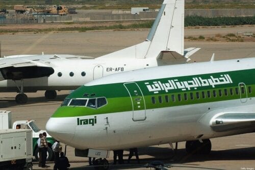 An Iraqi Airways Boeing 737 sits on the tarmac at Baghdad International Airport September 18, 2004 Baghdad. [Photo by Wathiq Khuzaie/Getty Images]