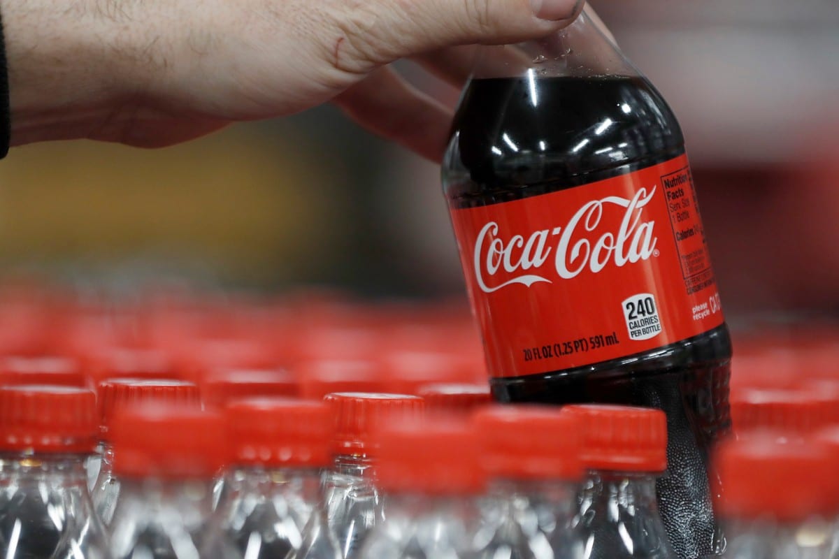 A bottle of Coca-Cola at a bottling plant in Utah on 10 February 2017 [George Frey/Getty Images]