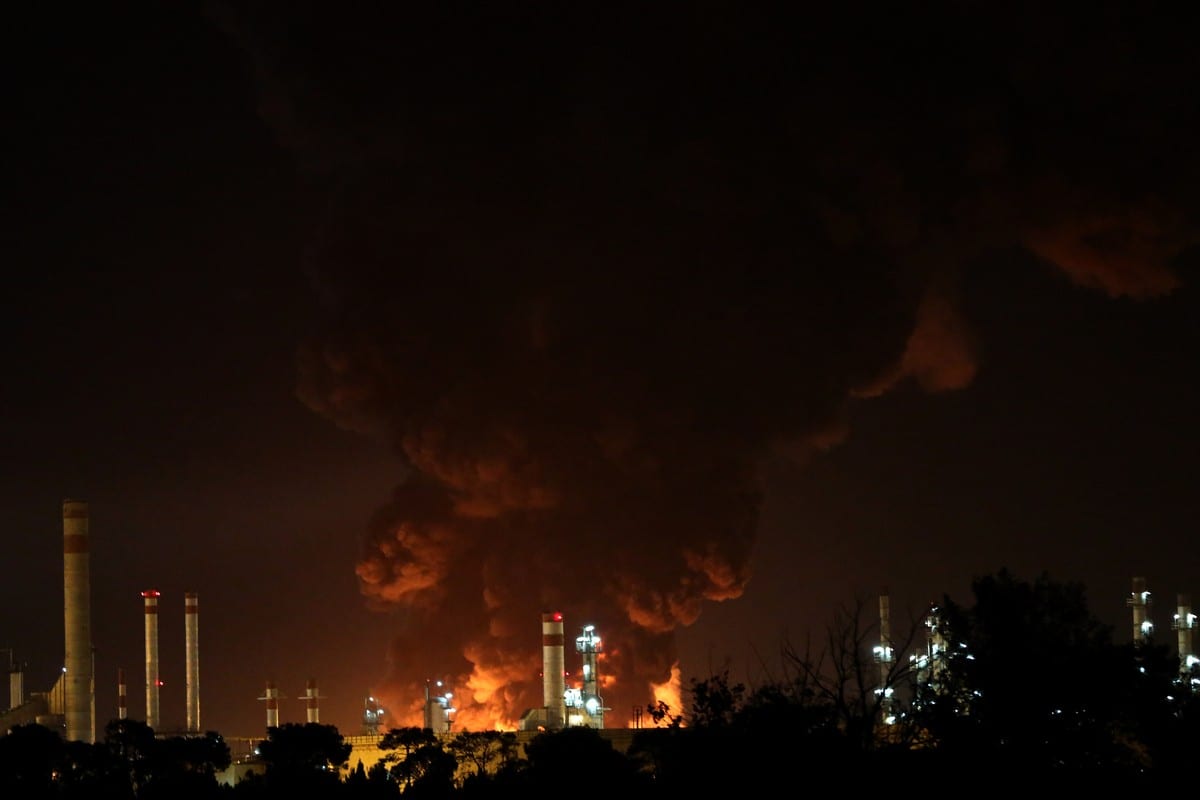 Smoke and flames rise after a fire broke out at Shahid Tondgooyan Oil Refinery in Tehran, Iran on June 02, 2021 [Fatemeh Bahrami - Anadolu Agency]