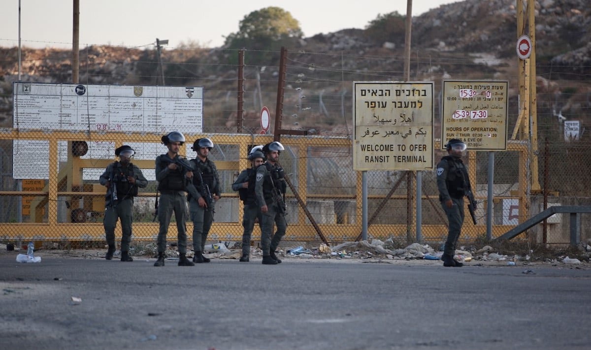 Israeli forces outside Ofer prison in the West Bank on 12 July 2021 [Issam Rimawi/Anadolu Agency]