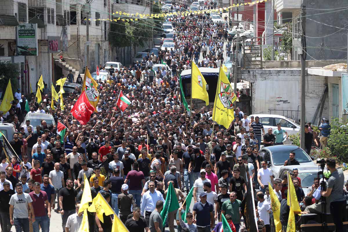 Funeral ceremony held for 12 year old Palestinian Mohammad al-Alaami who was shot by Israeli soldiers near the West Bank town of Beit Ummar in Hebron, West Bank on 29 July 2021. [Mamoun Wazwaz - Anadolu Agency]