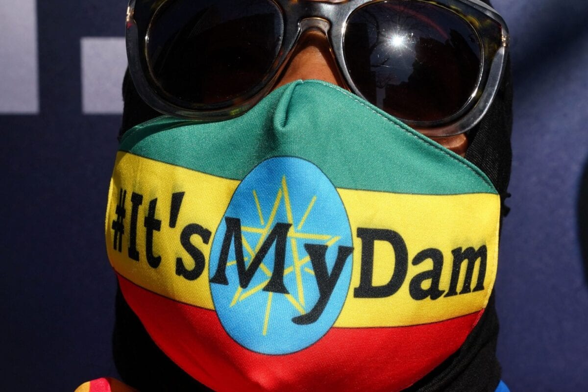 Protestors march down 42nd Street in New York during a "It's my Dam" protest on March 11, 2021 [TIMOTHY A. CLARY/AFP via Getty Images]