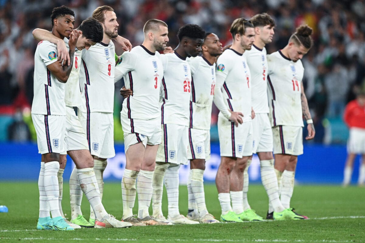 Marcus Rashford (L) of England reacts with teammates after his penalty miss during the UEFA Euro 2020 Championship Final between Italy and England at Wembley Stadium on July 11, 2021 in London, England [GES-Sportfoto/Getty Images]
