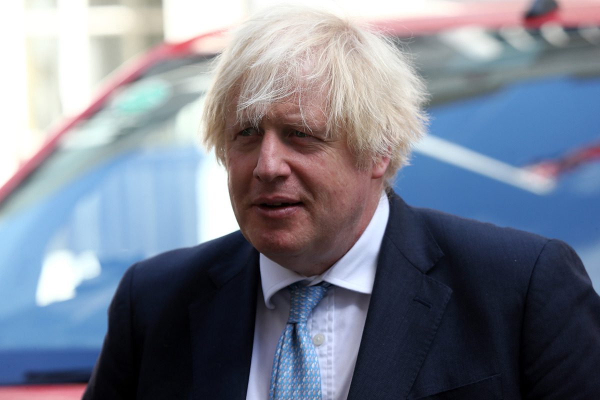 UK Prime Minister Boris Johnson poses with electric cars outside 10 Downing Street in London, United Kingdom on 29 July 2021. [Tayfun Salci - Anadolu Agency]