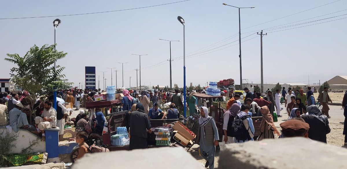 KABUL, AFGHANISTAN-AUGUST 21: Afghans continue to wait around the Hamid Karzai International Airport as they try to flee the Afghan capital of Kabul, Afghanistan on August 21, 2021. ( Sayed Khodaiberdi Sadat - Anadolu Agency )